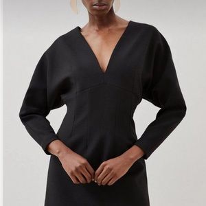 Tailored compact stretch rounded sleeve mini dress.